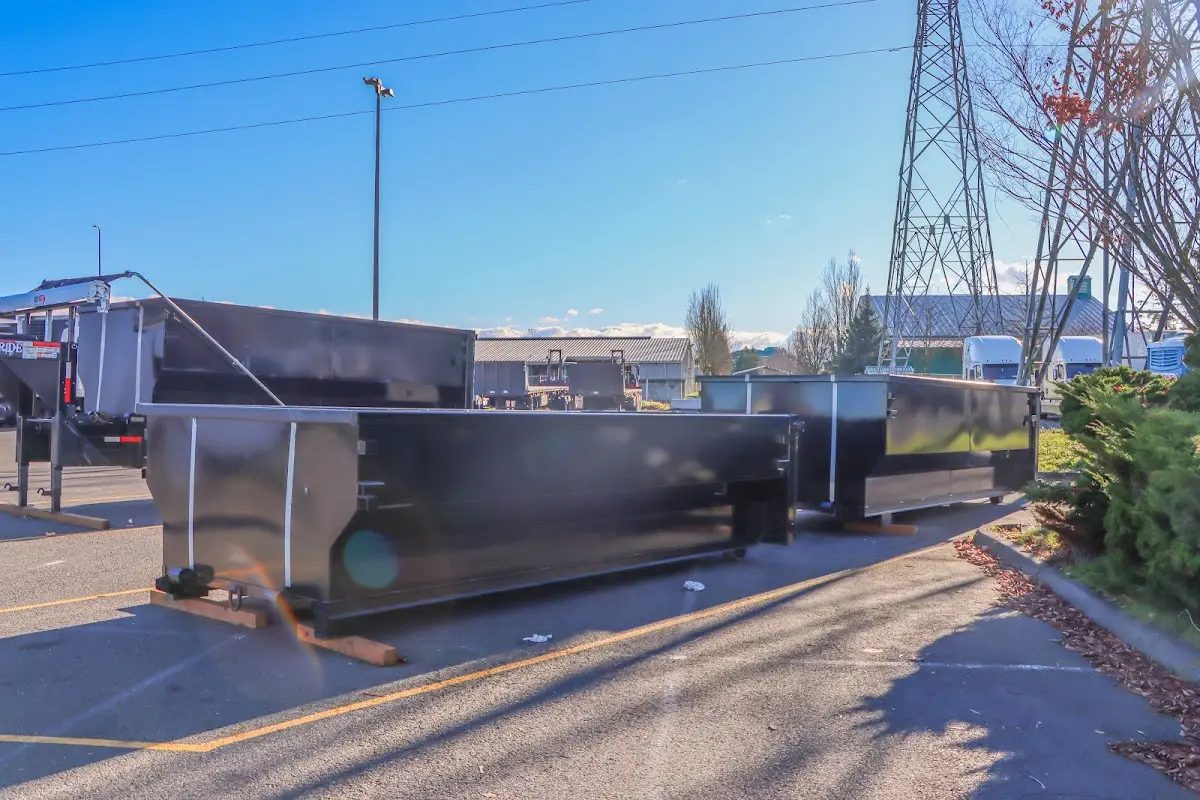 Roll-off dumpster ready for waste disposal at job site for 2 Yard Dumpster Rental in Pacific Grove